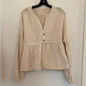 Cream Textured peplum top